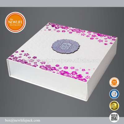 Hard white box with red apricot blossom